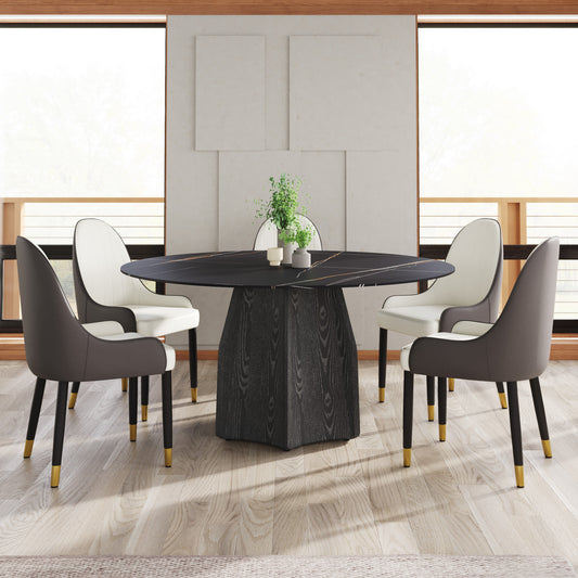 Modern dining set with a round black marble table and four upholstered chairs