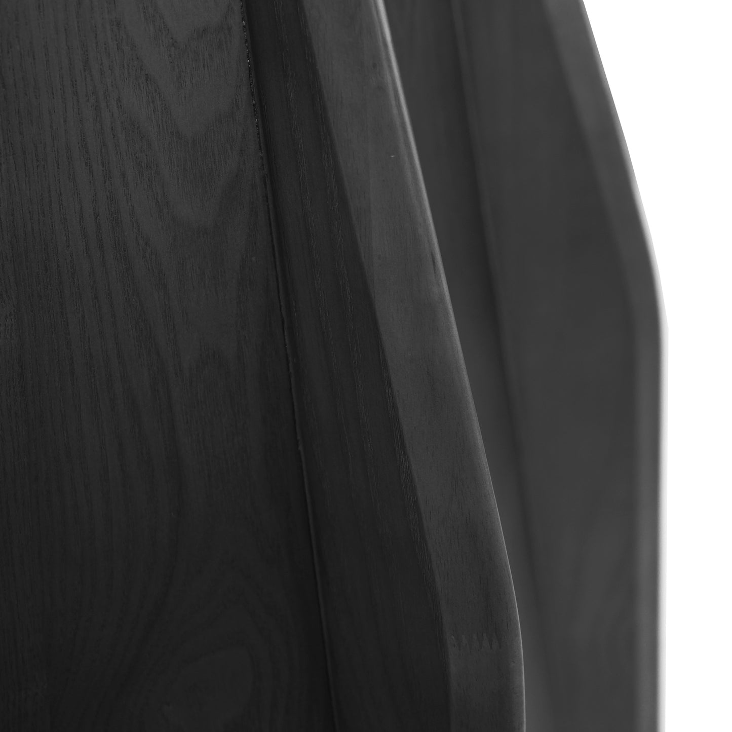 Closeup of dark stained oak wood grain texture on a modern furniture piece
