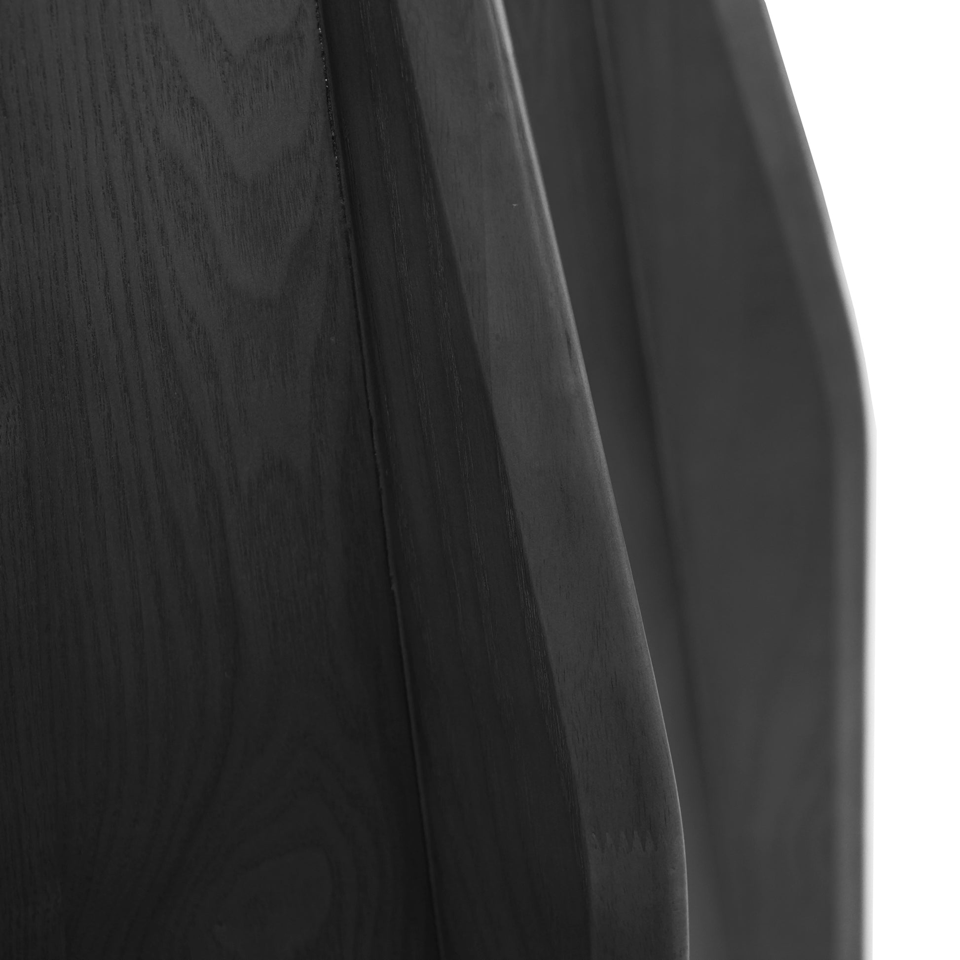Closeup of dark stained oak wood grain texture on a modern furniture piece