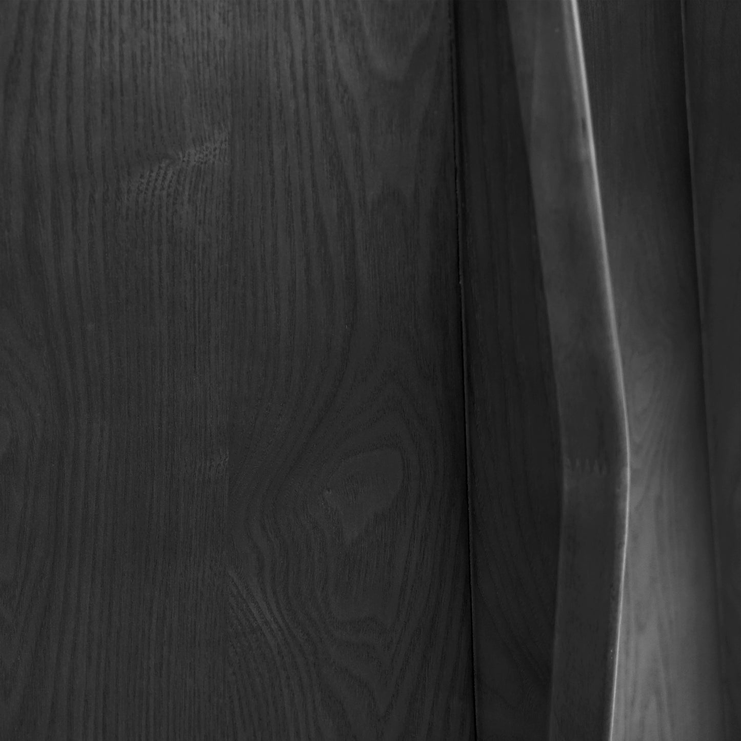 Dark wood grain texture on furniture panel