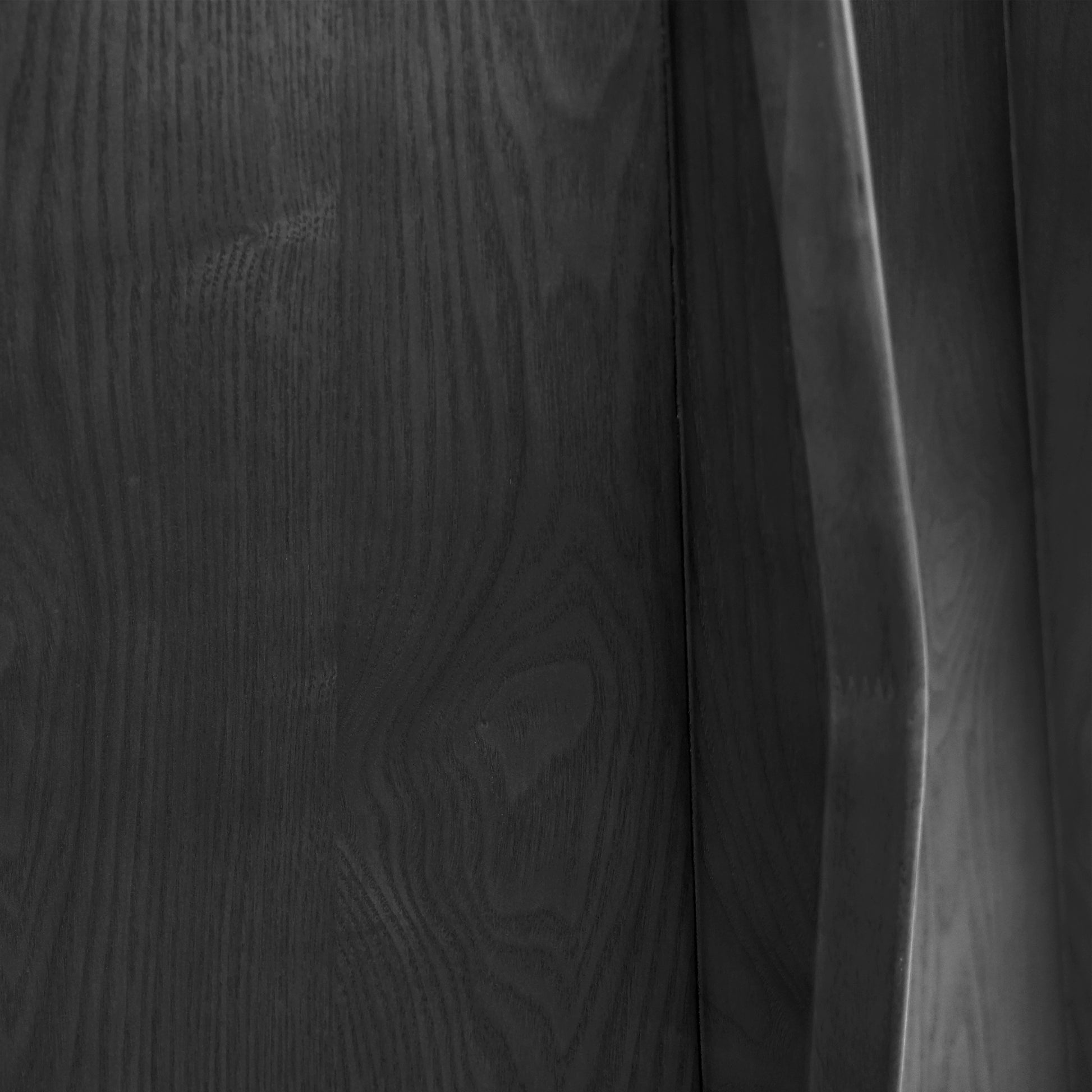 Dark wood grain texture on furniture panel