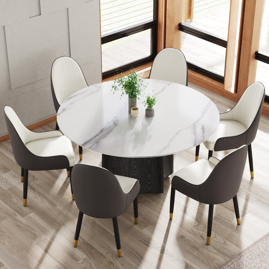 Round marble dining table with six upholstered chairs