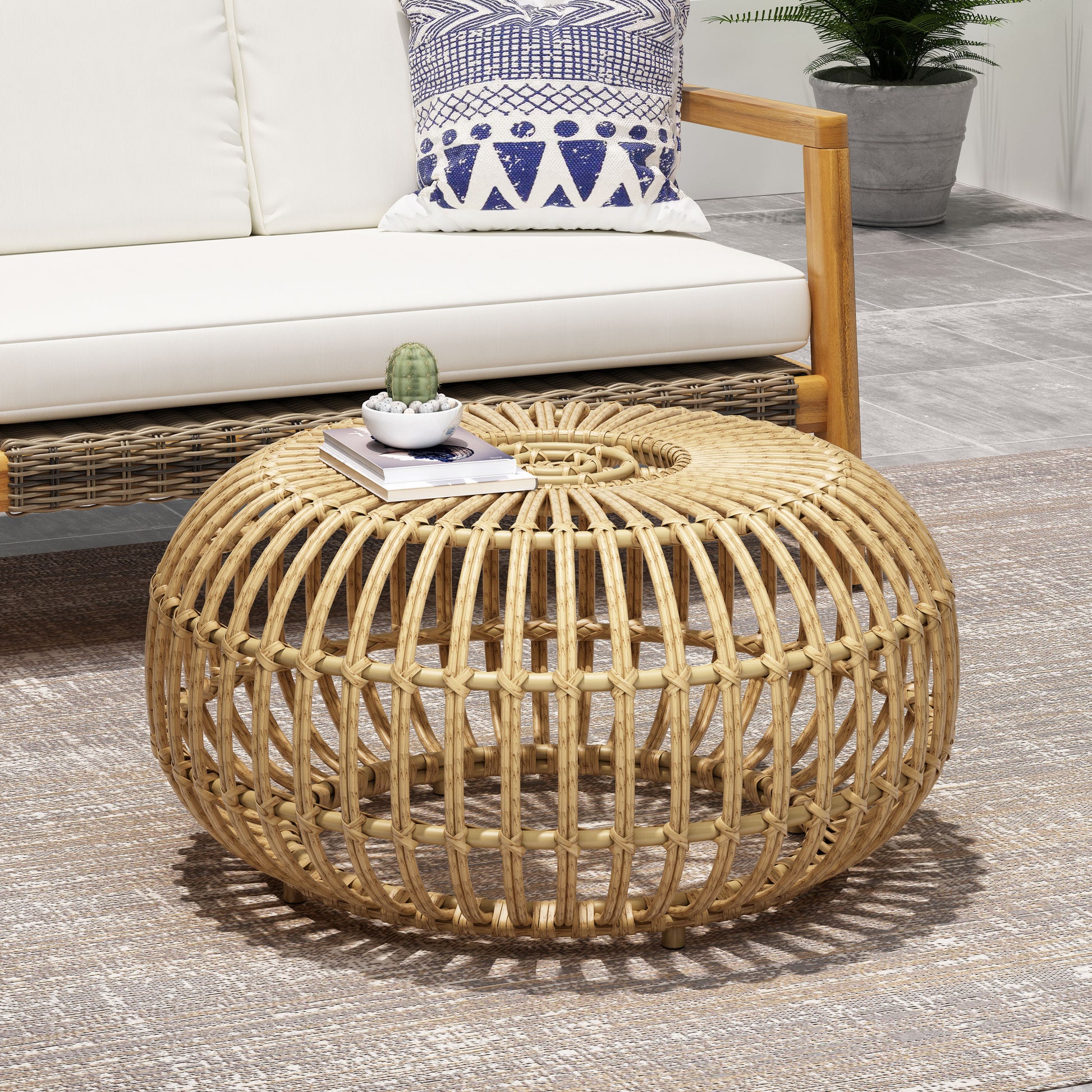 Natural woven rattan round coffee table with intricate knot detailing