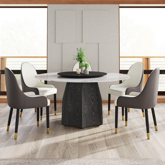 Modern marble dining table with swivel base and upholstered chairs