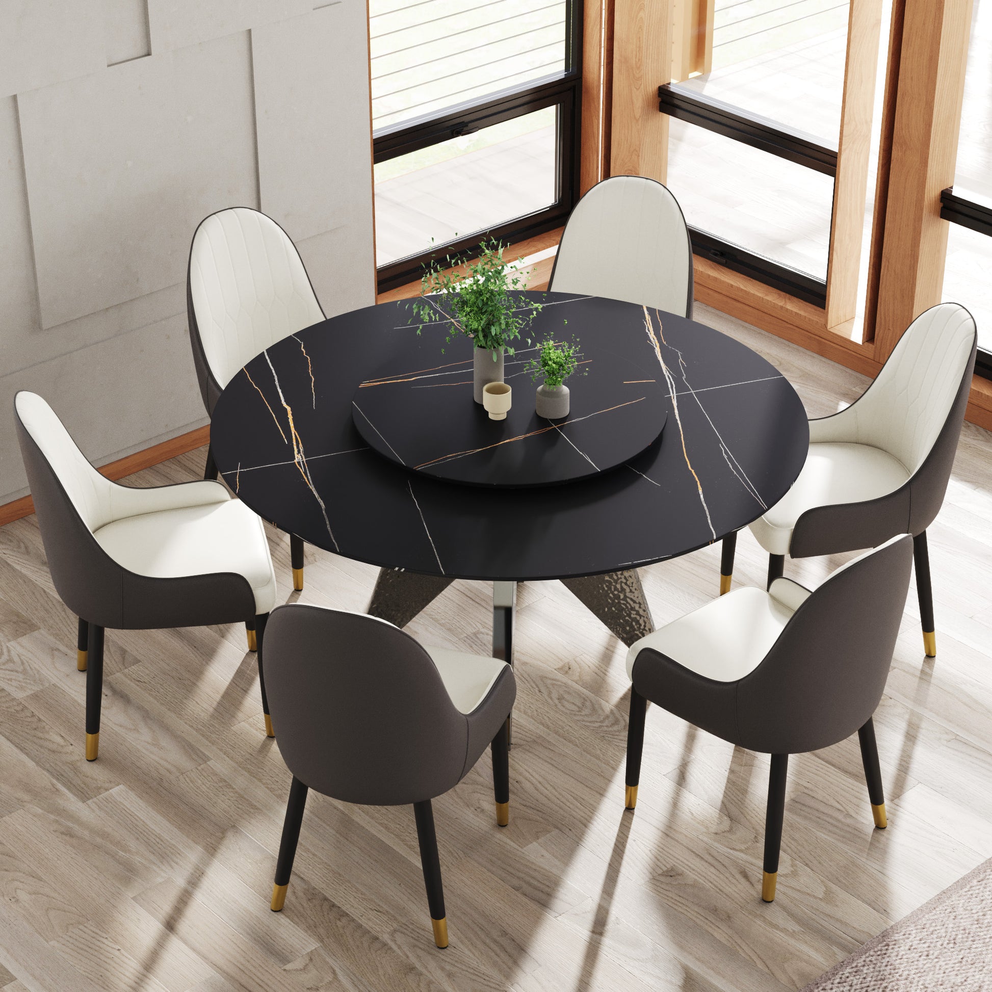 Round marble dining table with gold veining and upholstered chairs