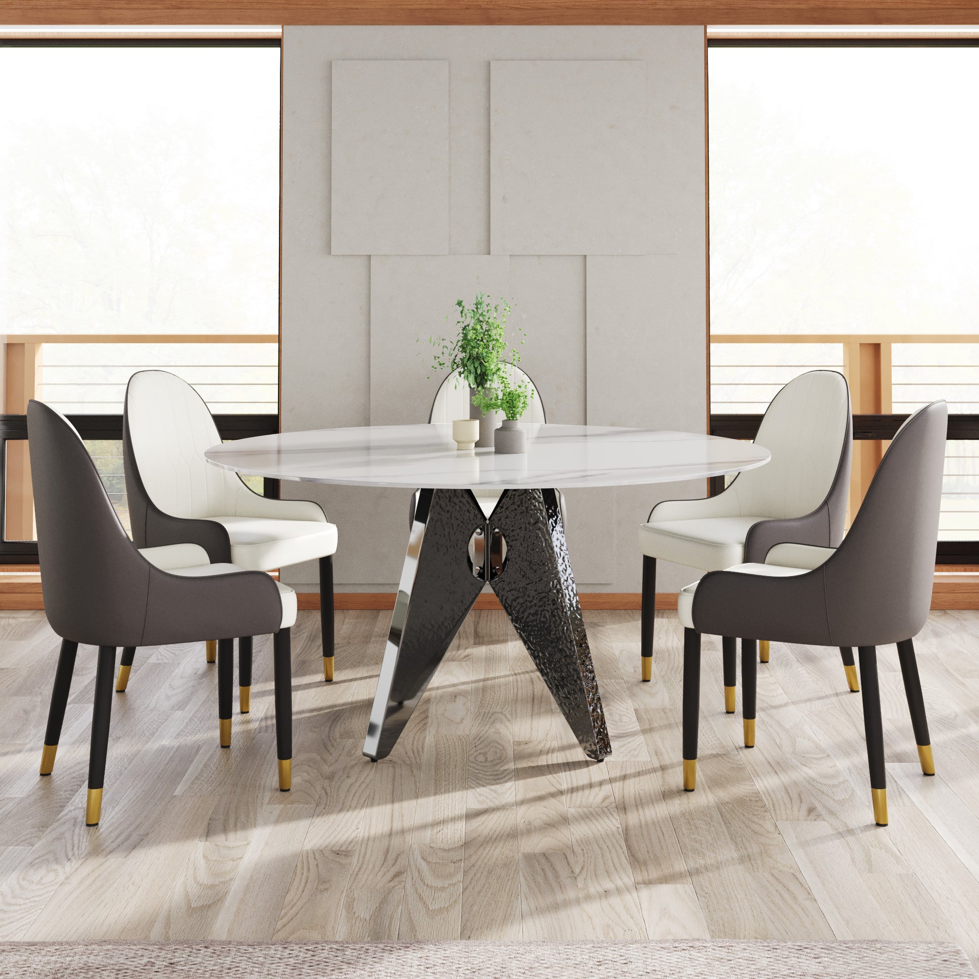 Modern round marble dining table with abstract metallic base