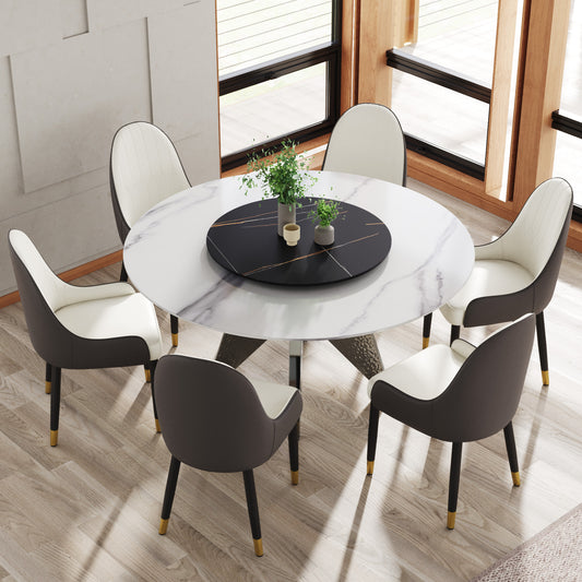 Round marble dining table with upholstered chairs