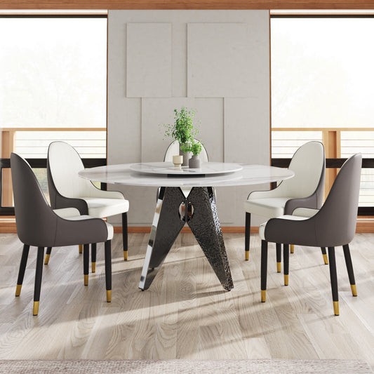 Modern white marble dining table with rotating tray and four upholstered chairs