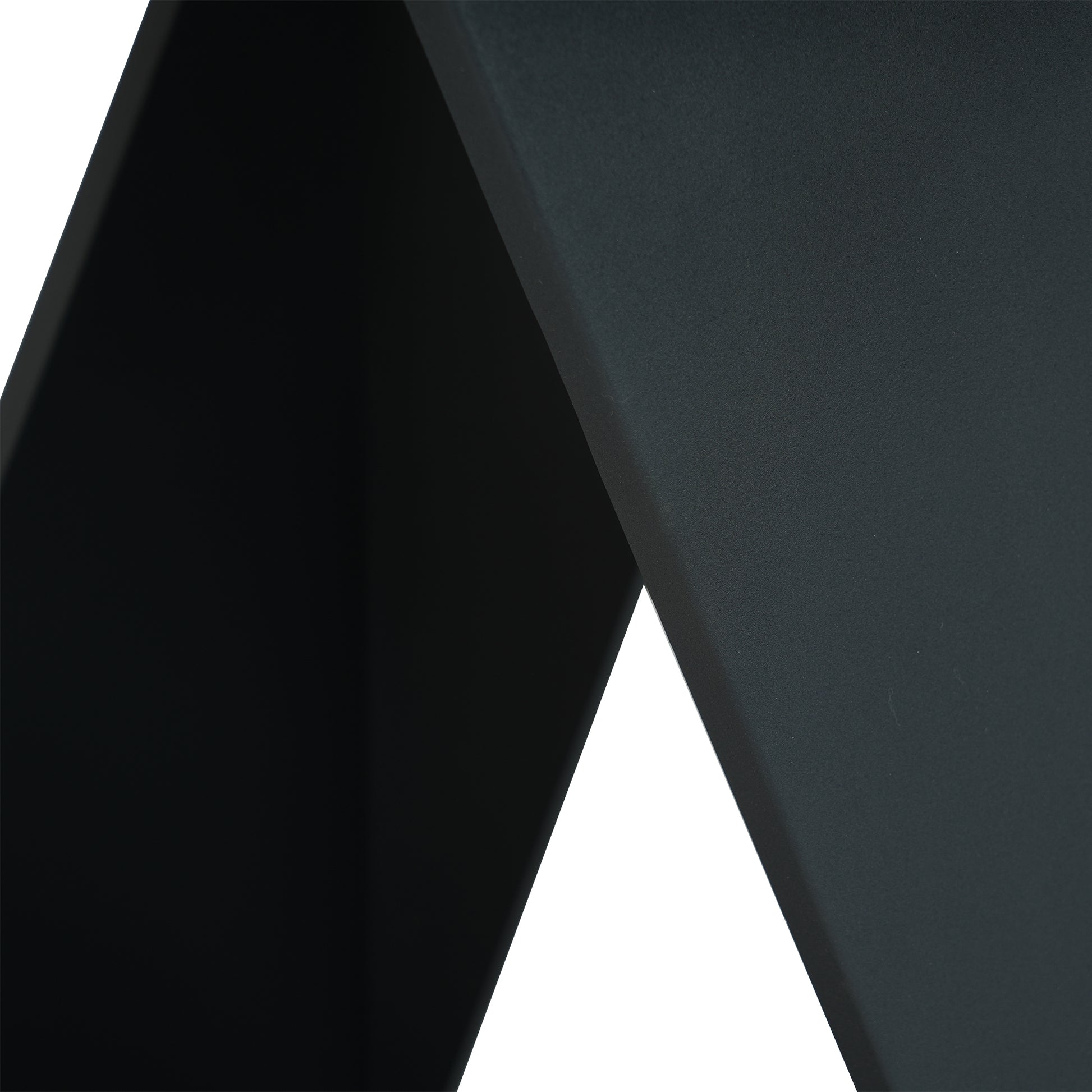 Matte black abstract metal sculpture with clean lines