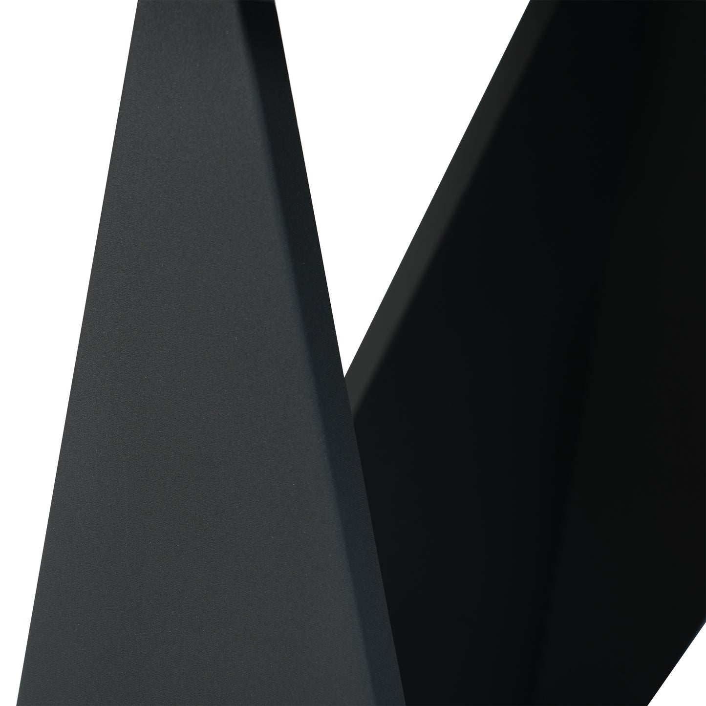 Dark gray textured matte metal corner sculpture with sharp edges