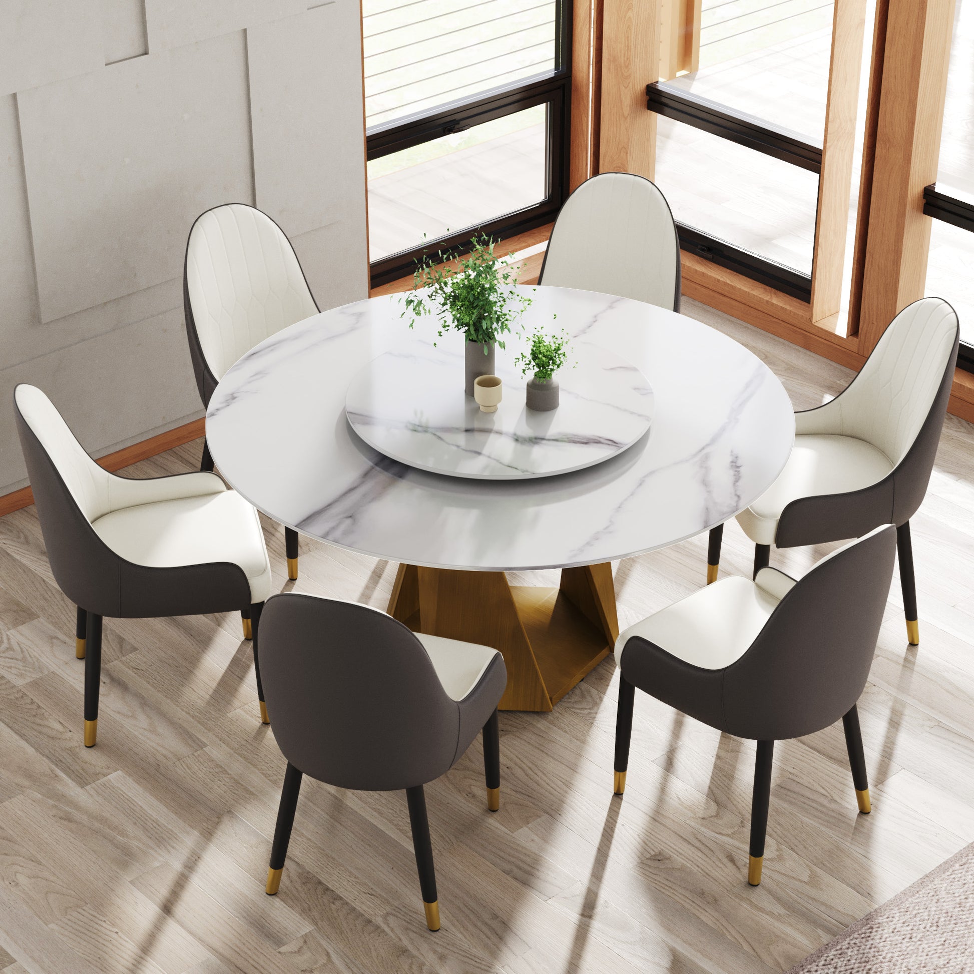 White marble dining table with gold geometric base and upholstered chairs