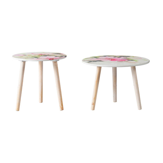 Two round side tables with floral print and light wood legs