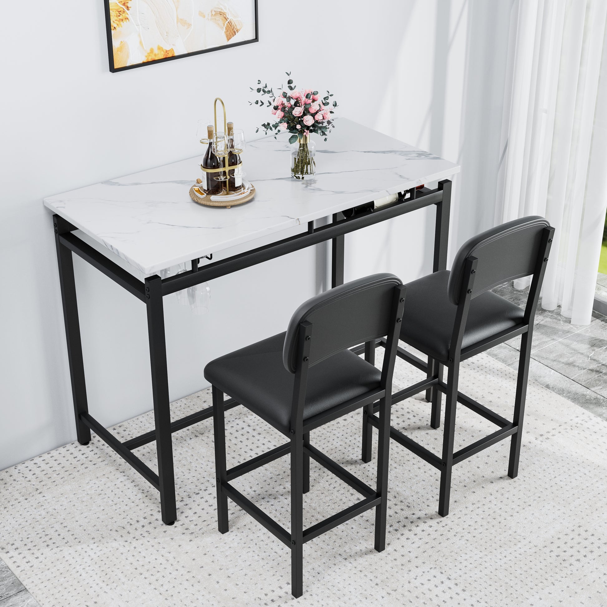 White marble top bar table with two black stools