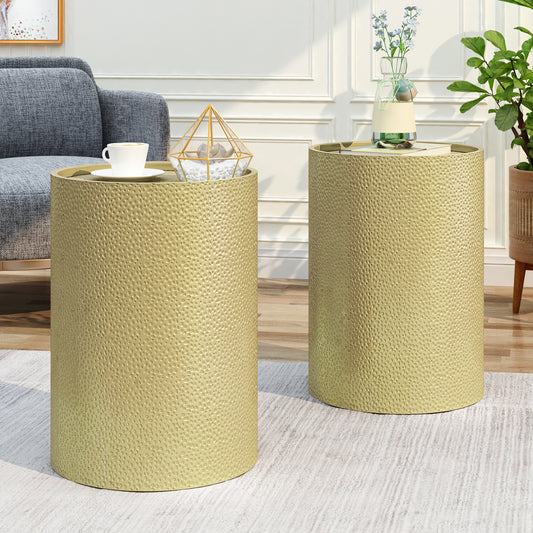 Gold hammered metal round side table with textured surface