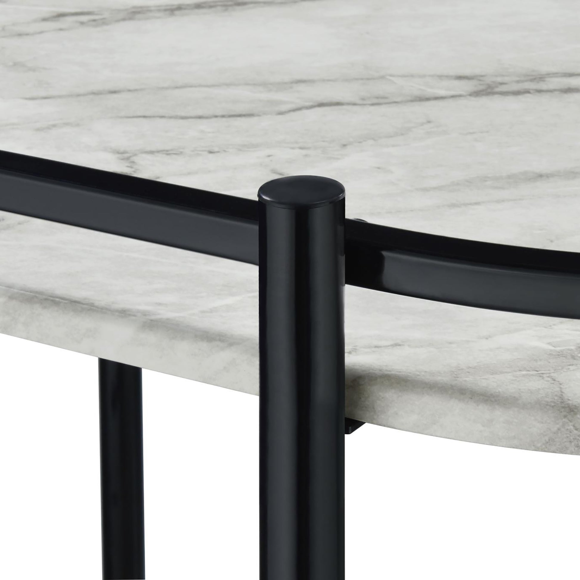 Round marble coffee table top with black metal legs and frame detail