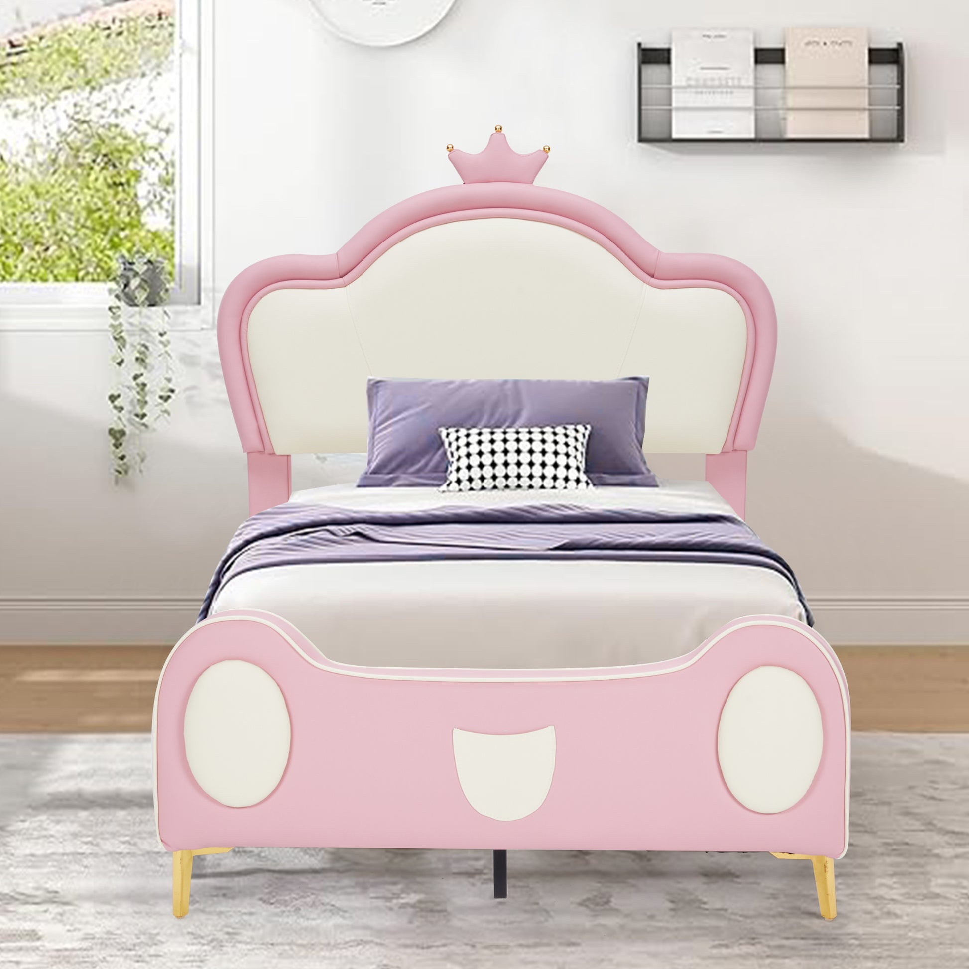 Pink carshaped twin bed with crown headboard perfect for kids bedrooms
