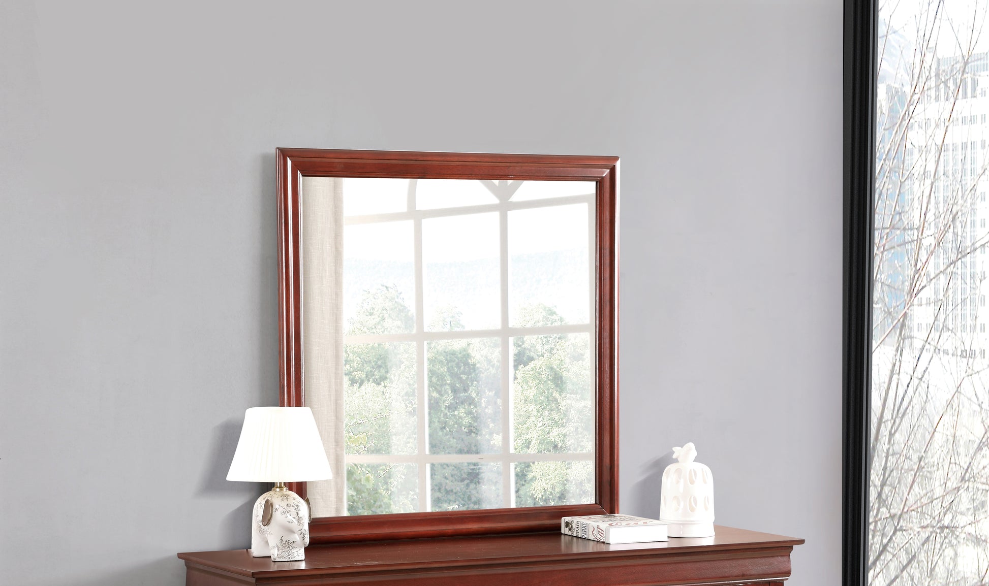 Dark cherry wood dresser mirror with ornate frame