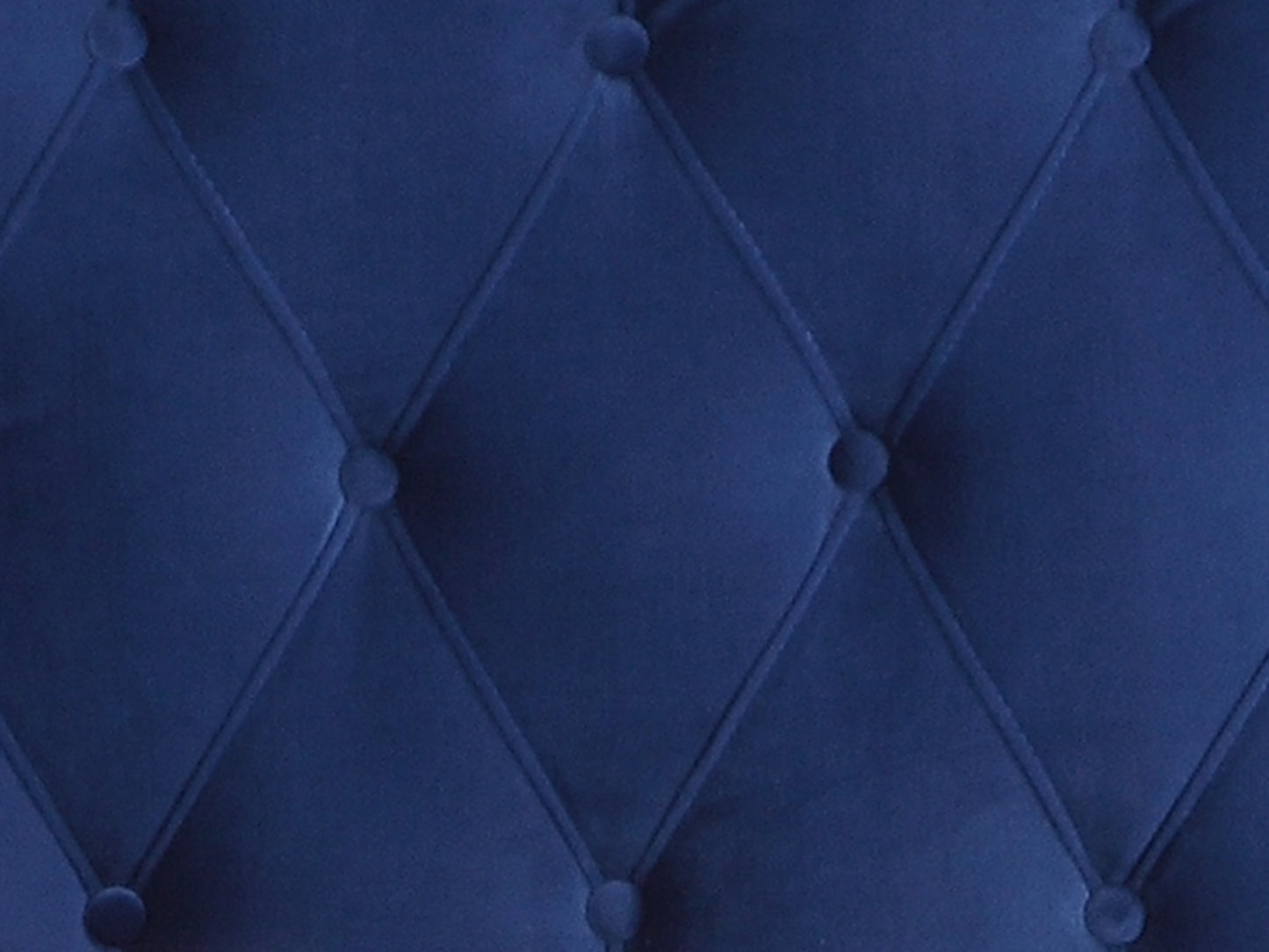 Deep navy velvet tufted fabric swatch for upholstery