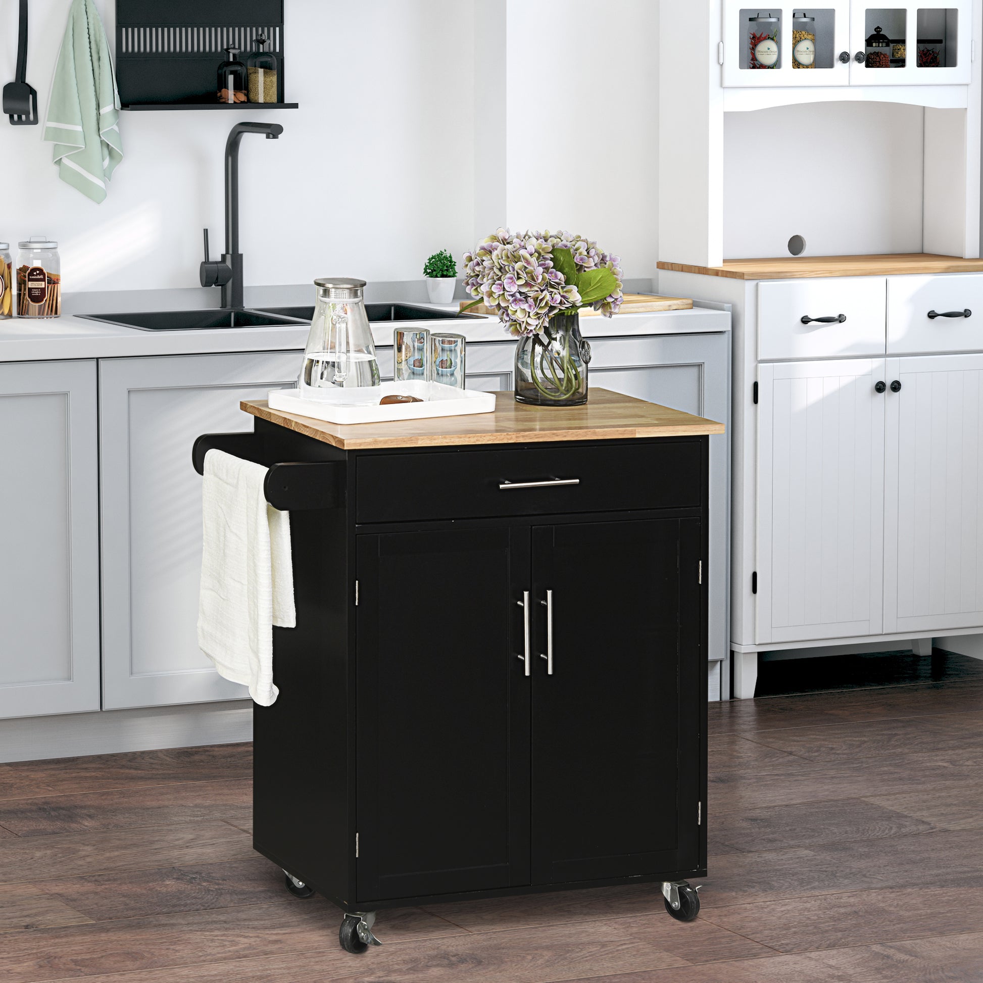Black kitchen island cart with wood top and towel rack