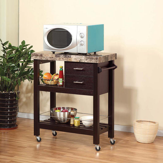 Stylish kitchen island with granite top and dark wood drawers holding microwave