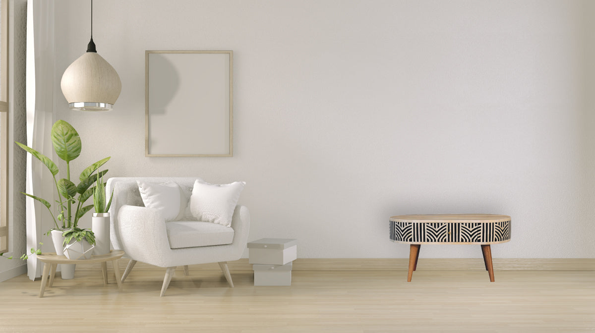 Modern white armchair with plush cushions and wooden legs for a cozy living room