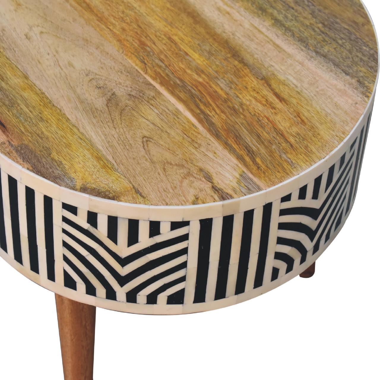 Round wooden side table with intricate bone inlay geometric pattern