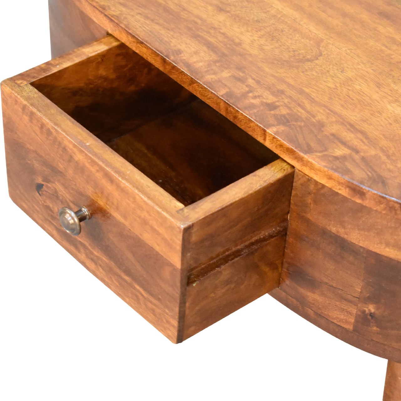 Brown wooden desk with an open drawer showing rich grain detail