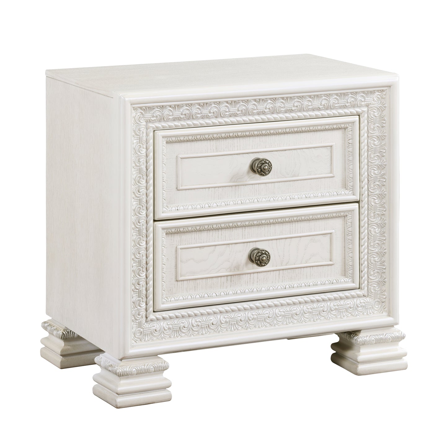 Antique white ornate nightstand with two drawers and decorative metal knobs