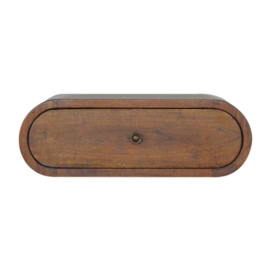 Rounded dark wood bedside table with a single drawer and brass knob