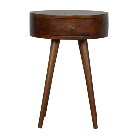 Round dark wood bedside table with a single drawer and brass knob