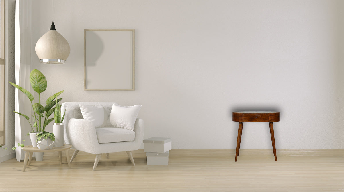 Plush white accent chair with clean lines and crisp white pillows