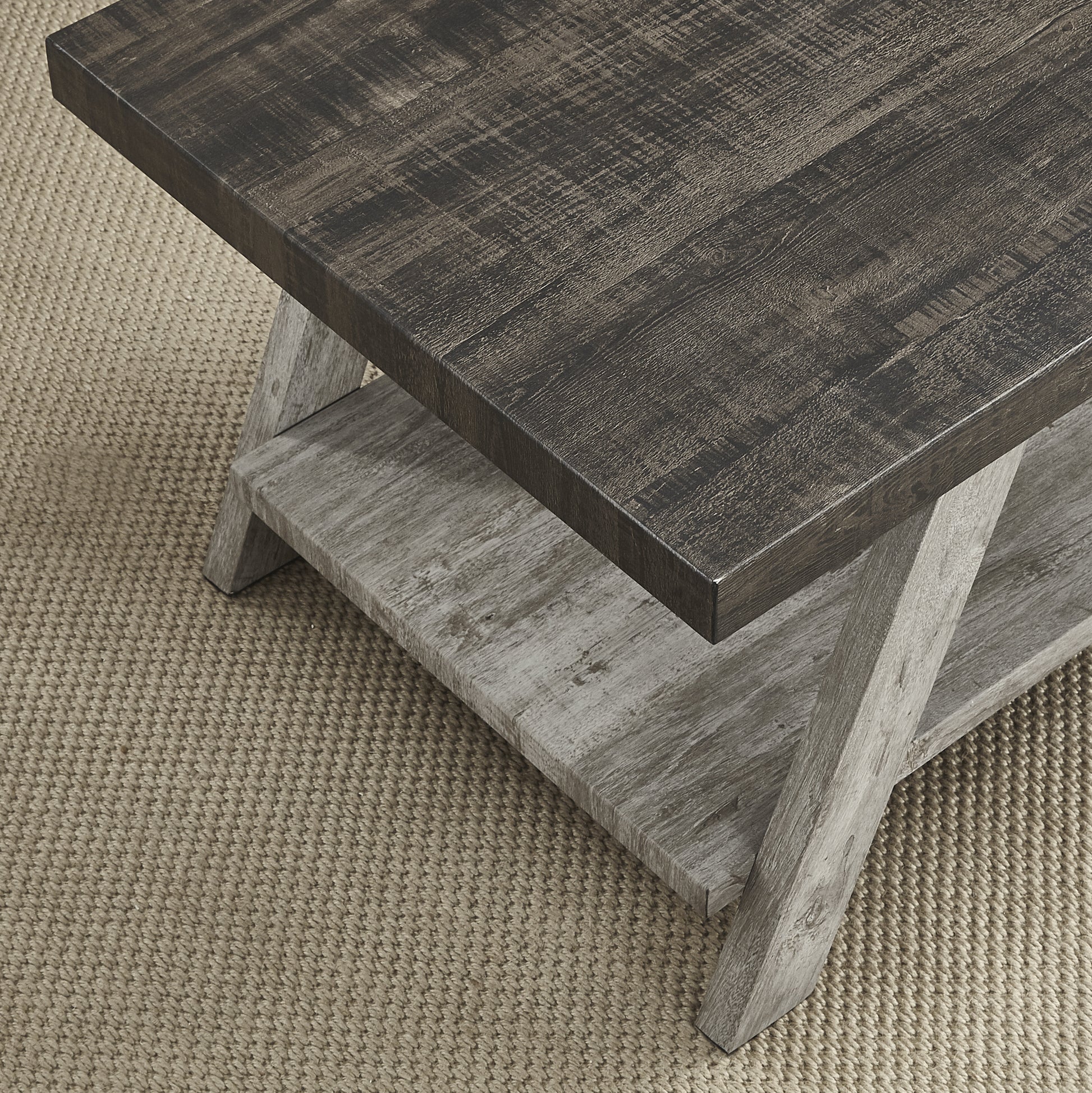 Rustic dark wood coffee table with distressed finish and lower shelf