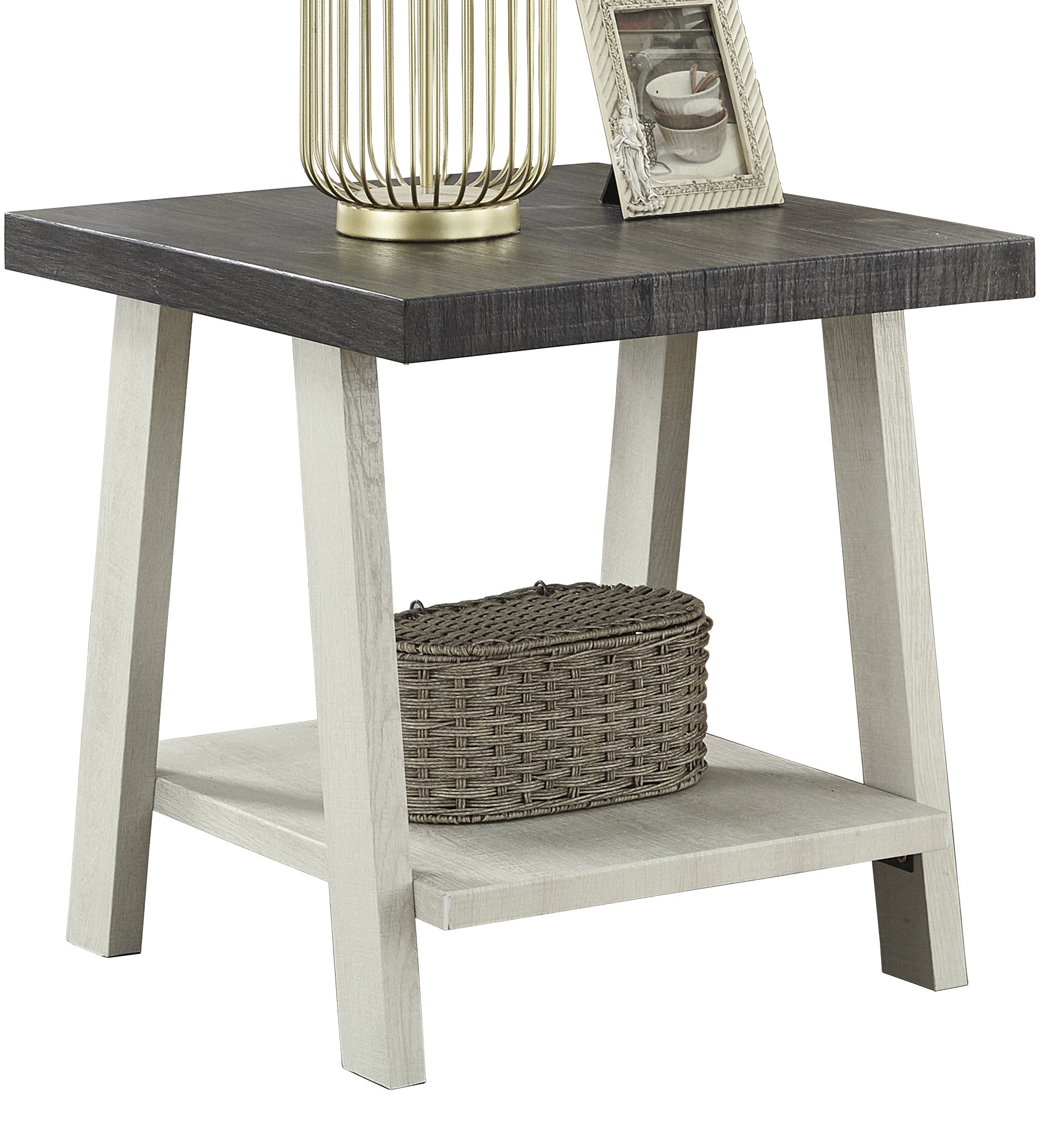 Distressed gray wood end table with white legs and a woven storage basket