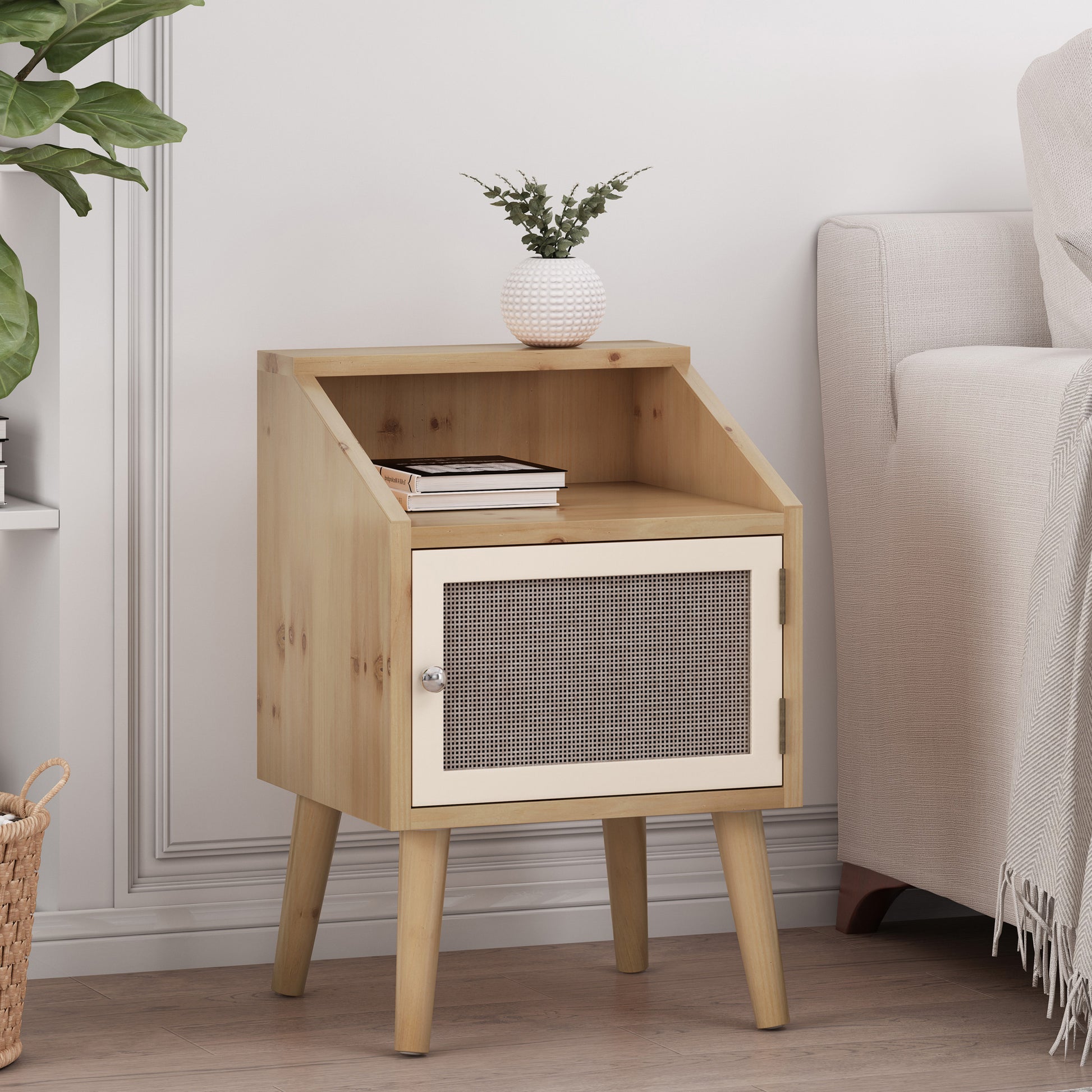 Light wood bedside table with a cane door and modern tapered legs