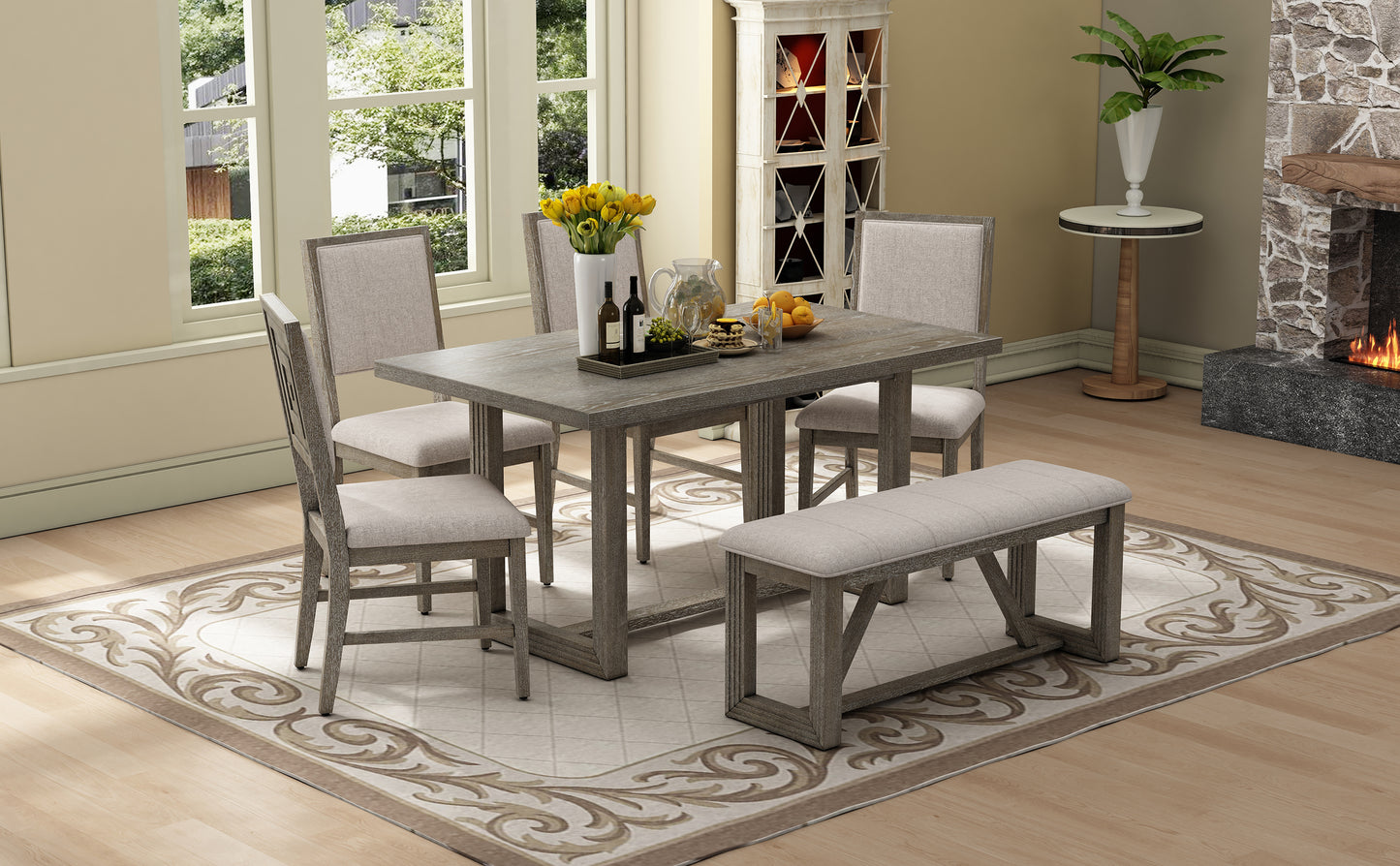 Rustic grey wood dining table set with upholstered chairs and bench