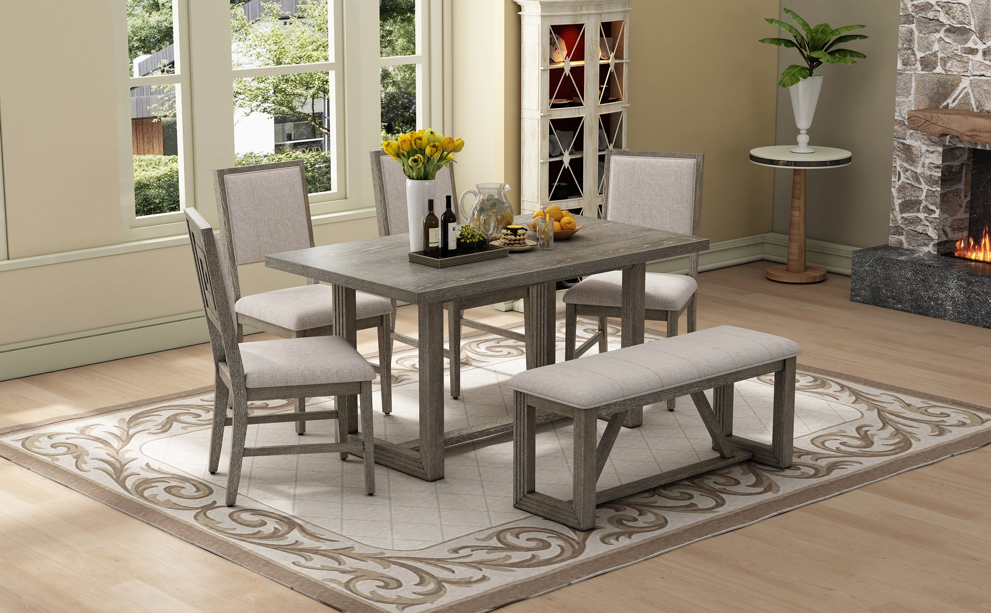 Rustic grey wood dining table set with upholstered chairs and bench