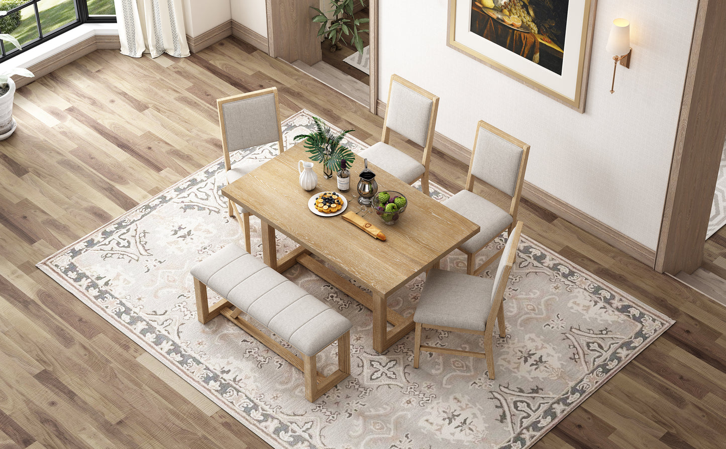 Light oak dining table set with four upholstered chairs and one bench