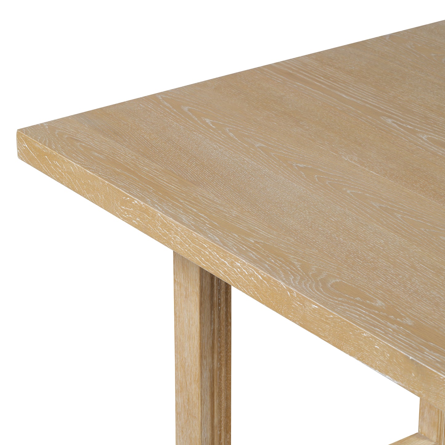 Closeup of a light oak dining table with a natural grain finish
