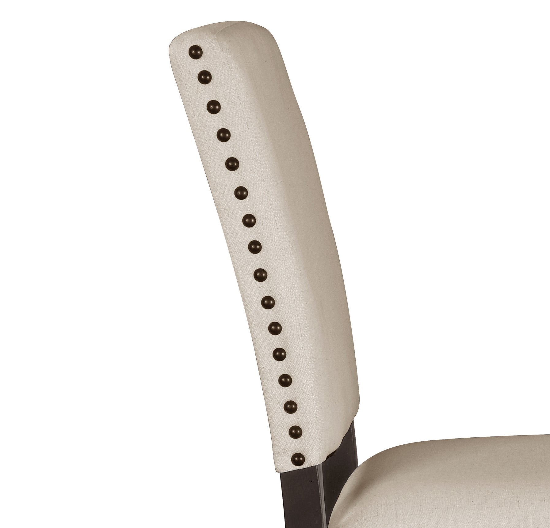 Beige linen dining chair back with antique brass nailhead trim
