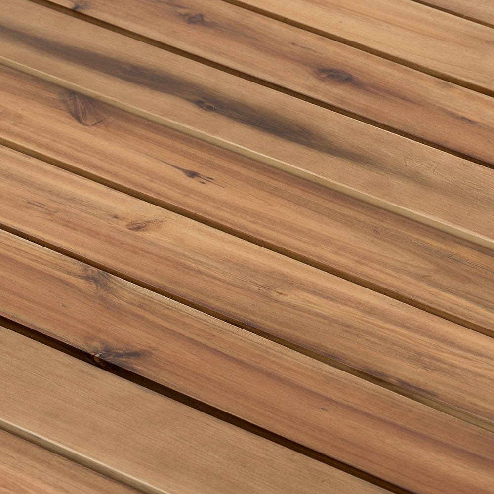 Closeup of natural acacia wood planks with a warm honey finish for outdoor furniture