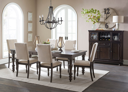 Dark wood dining table and chairs set with upholstered seating
