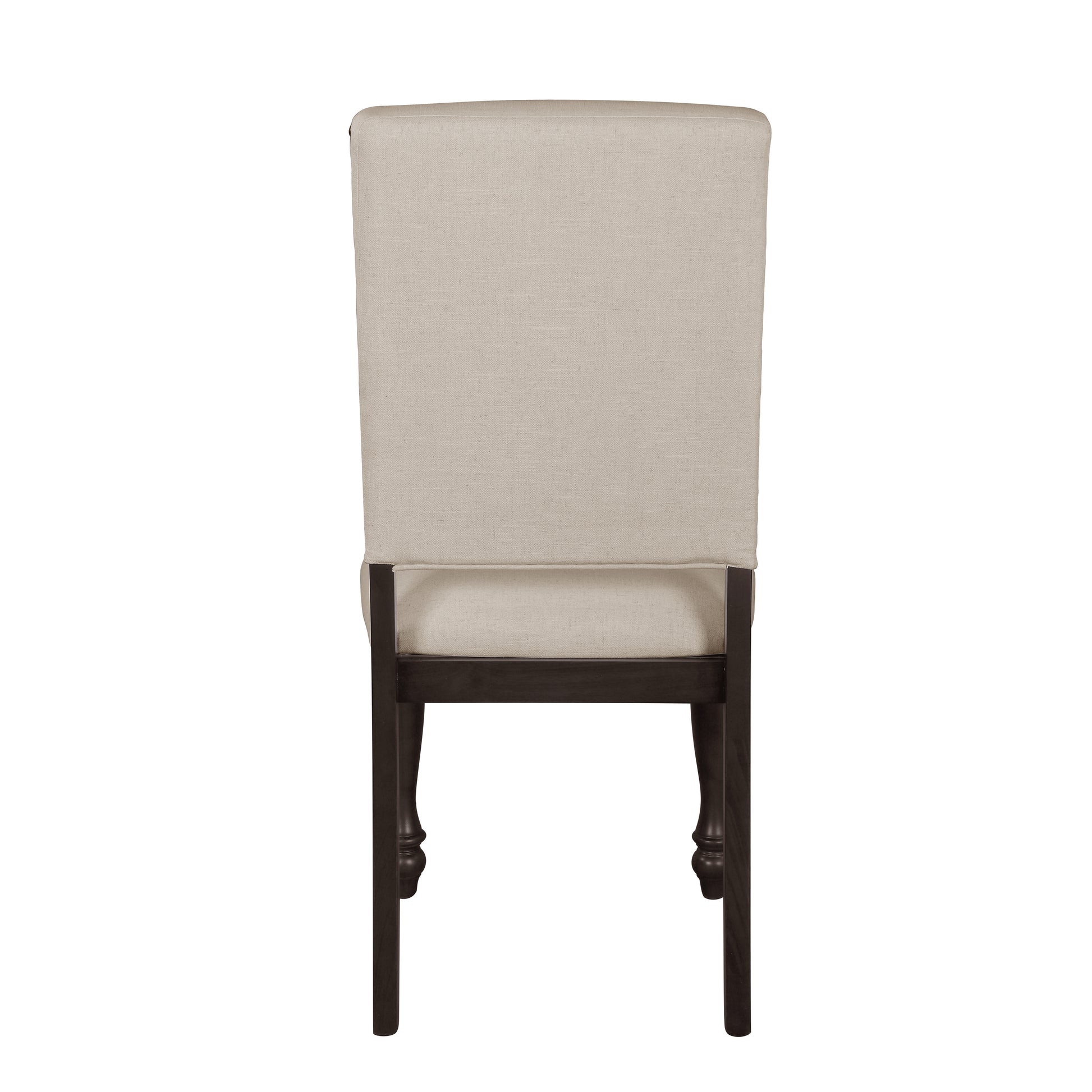 Back view of a beige upholstered dining chair with dark wood legs