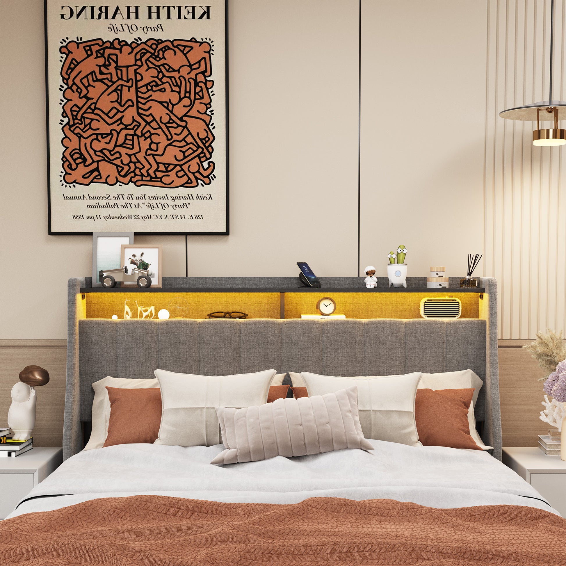 Gray upholstered headboard with builtin LED lighting and storage shelves