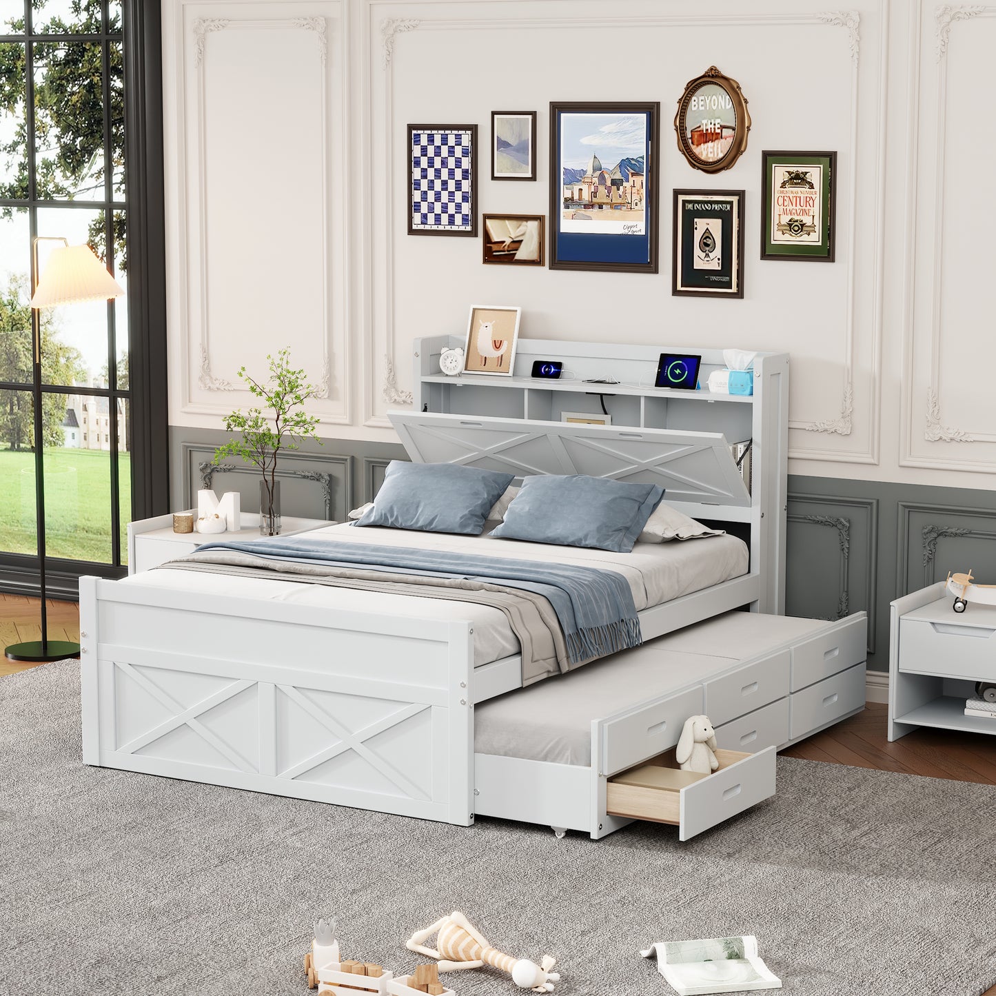 White twin bed with storage drawers and a pullout trundle