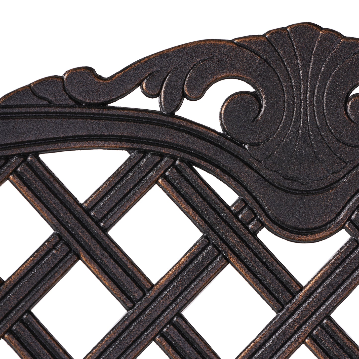 Bronze cast iron decorative scrollwork detail on outdoor furniture