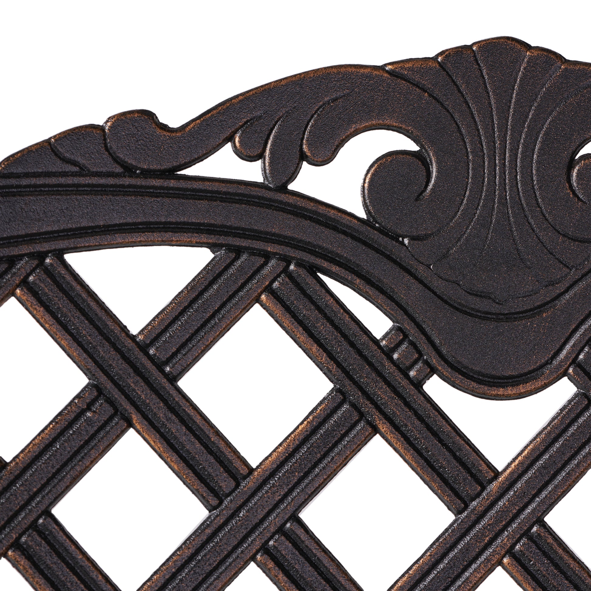 Bronze cast iron decorative scrollwork detail on outdoor furniture