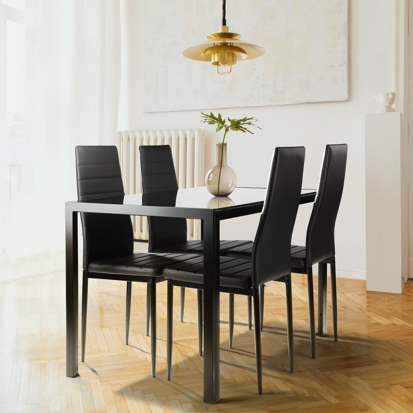 Black leather dining chairs with tufted seats