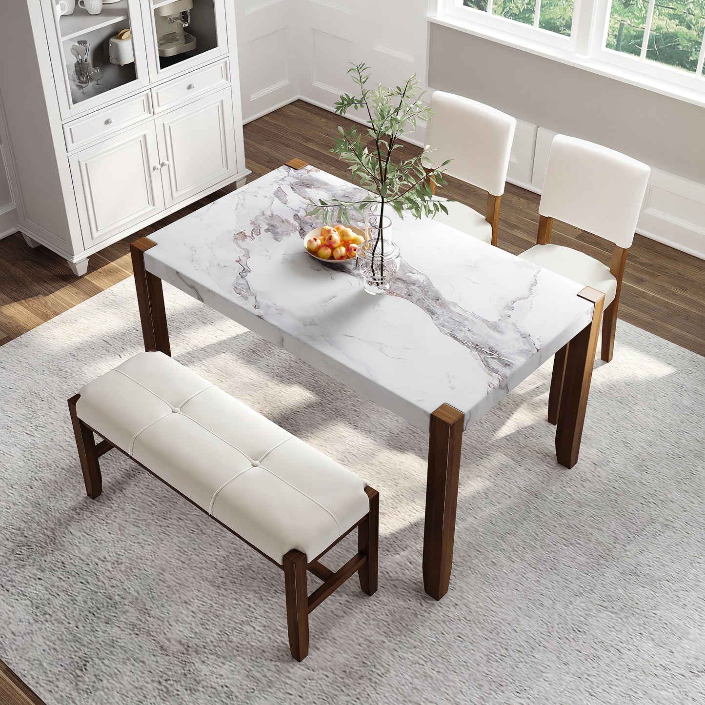 Marble dining table with wooden legs and white upholstered bench