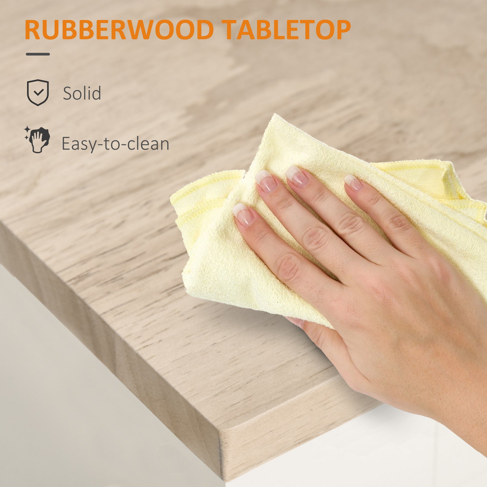 Solid rubberwood tabletop being wiped clean with a yellow microfiber cloth