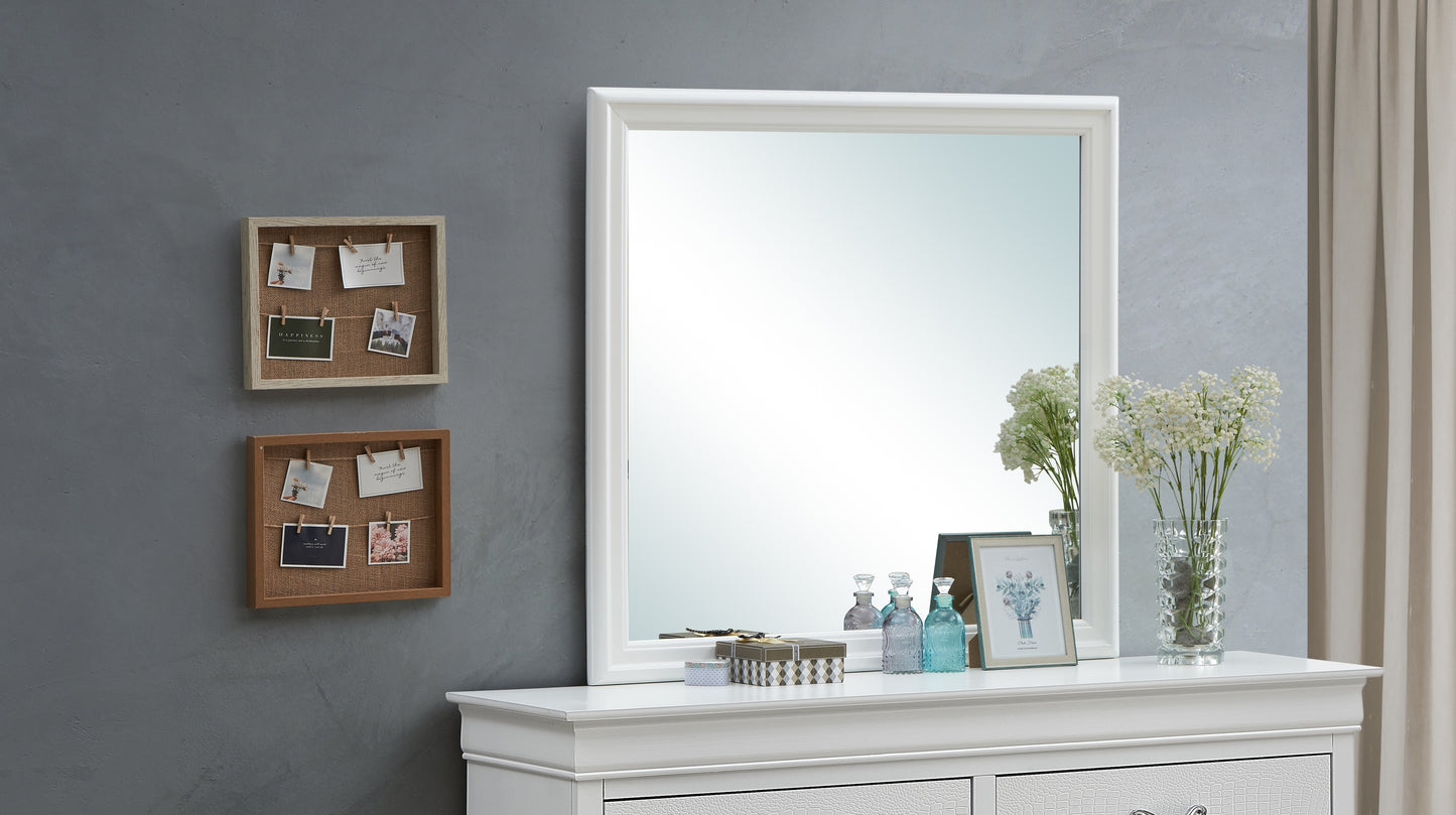 Elegant white framed mirror with decorative tabletop items